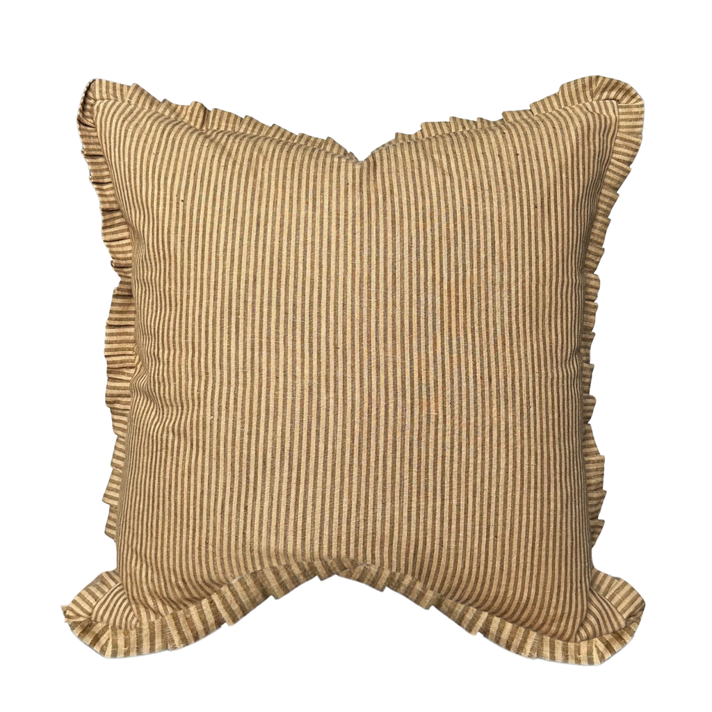 Textured pillow with ruffled edges on a white background
