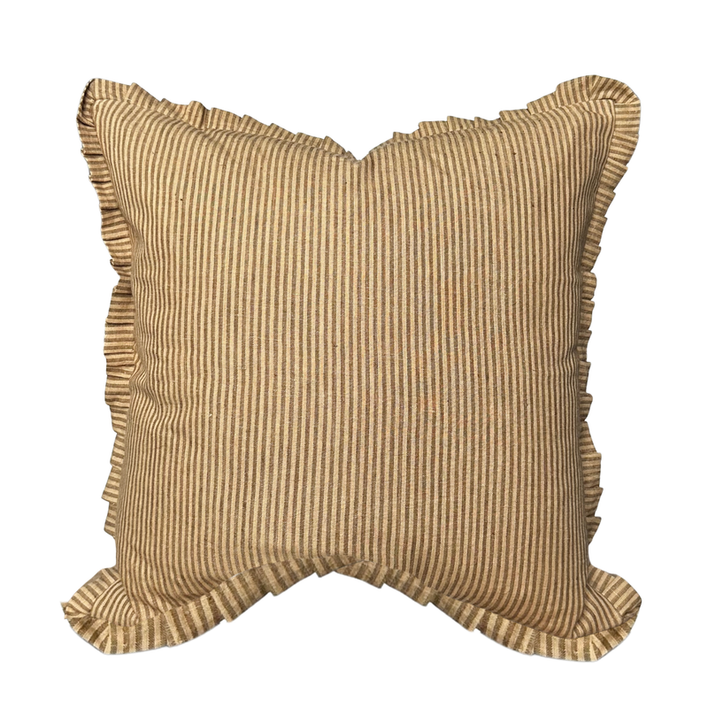 Textured pillow with ruffled edges on a white background