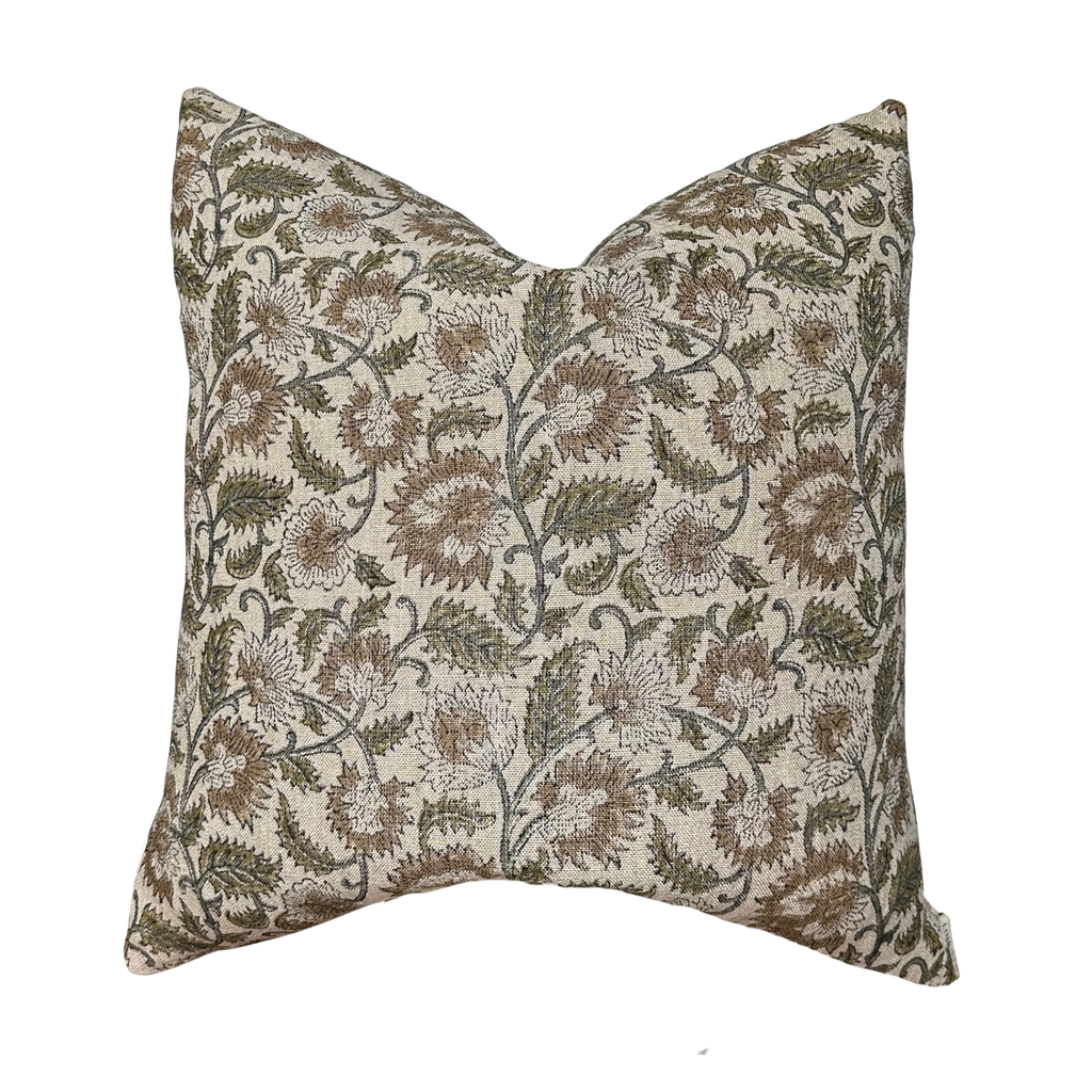 Decorative pillow with floral pattern on a white background