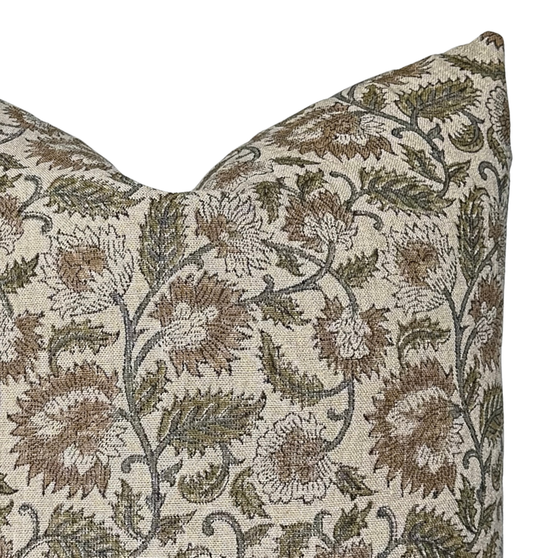 Decorative pillow with floral pattern on a white background