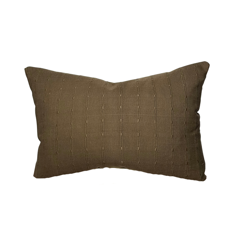 Brown textured pillow on a white background
